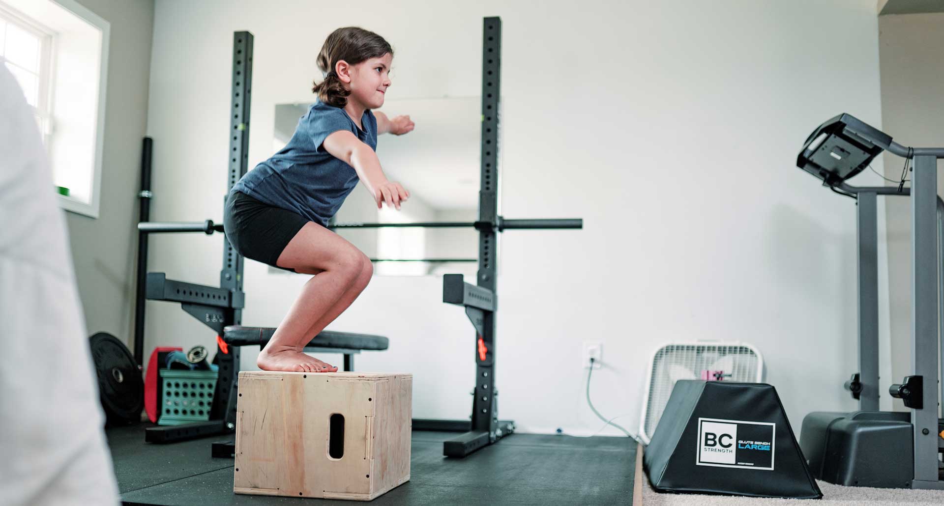 Girl jumping on Kids Fitness training