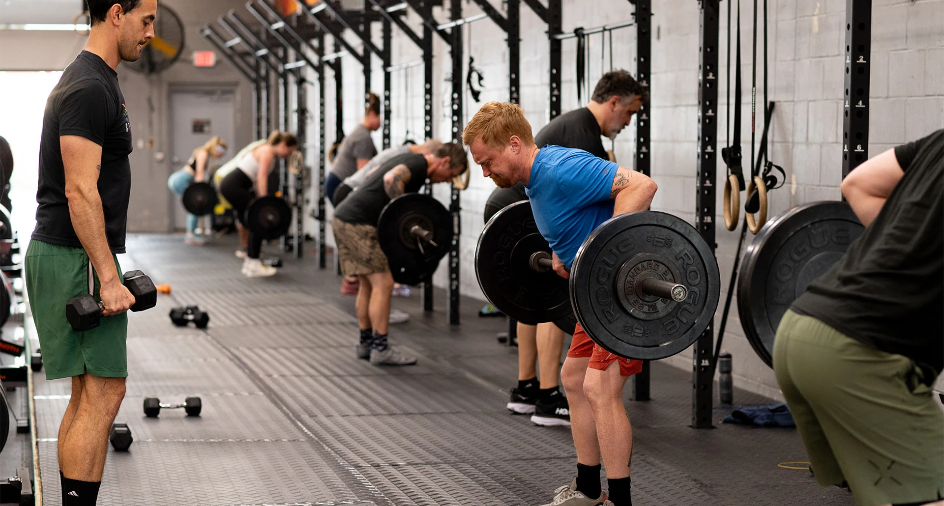 People strength training at Arsenal Strength